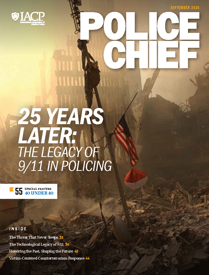 Police Chief September 2026 magazine cover features a damaged structural beam flying a U.S. flag amid rubble, dust, twisted debris, and ruined buildings, with IACP branding and the headline ‘25 Years Later: The Legacy of 9/11 in Policing,’ plus article listings and issue information