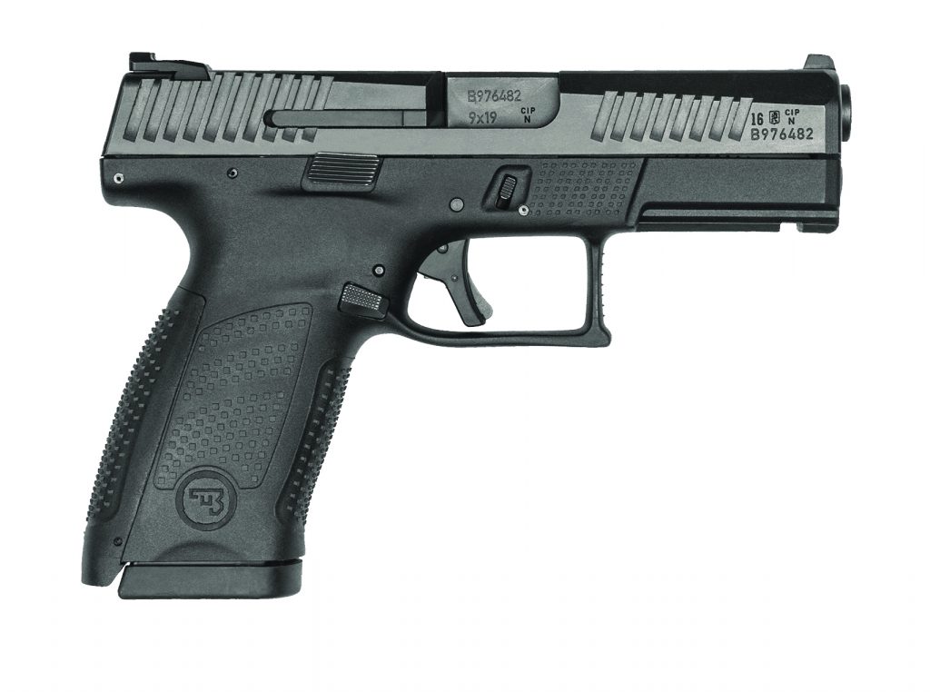 The image shows a black semi-automatic handgun with a textured grip. The model number "CCW009070" is visible on the side of the gun. The manufacturer's logo, "FN," is embossed on the grip. The slide has serrations at both the front and rear for better handling, and there is a trigger guard with a curved design. There are no faces or additional elements in this image; it solely focuses on the firearm against a plain background.