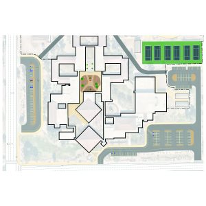 Building floor plan showing multiple connected sections, central courtyard with trees, surrounding parking lots, and tennis courts in the upper right corner