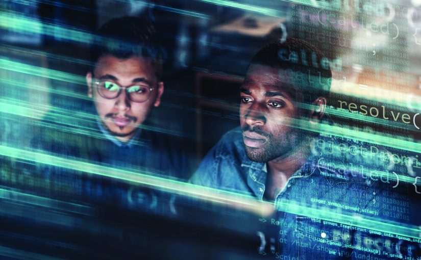 Two individuals sit at computer displaying code with terms like “resolve” and “function”; blue light streaks overlay scene, suggesting cyber operations.