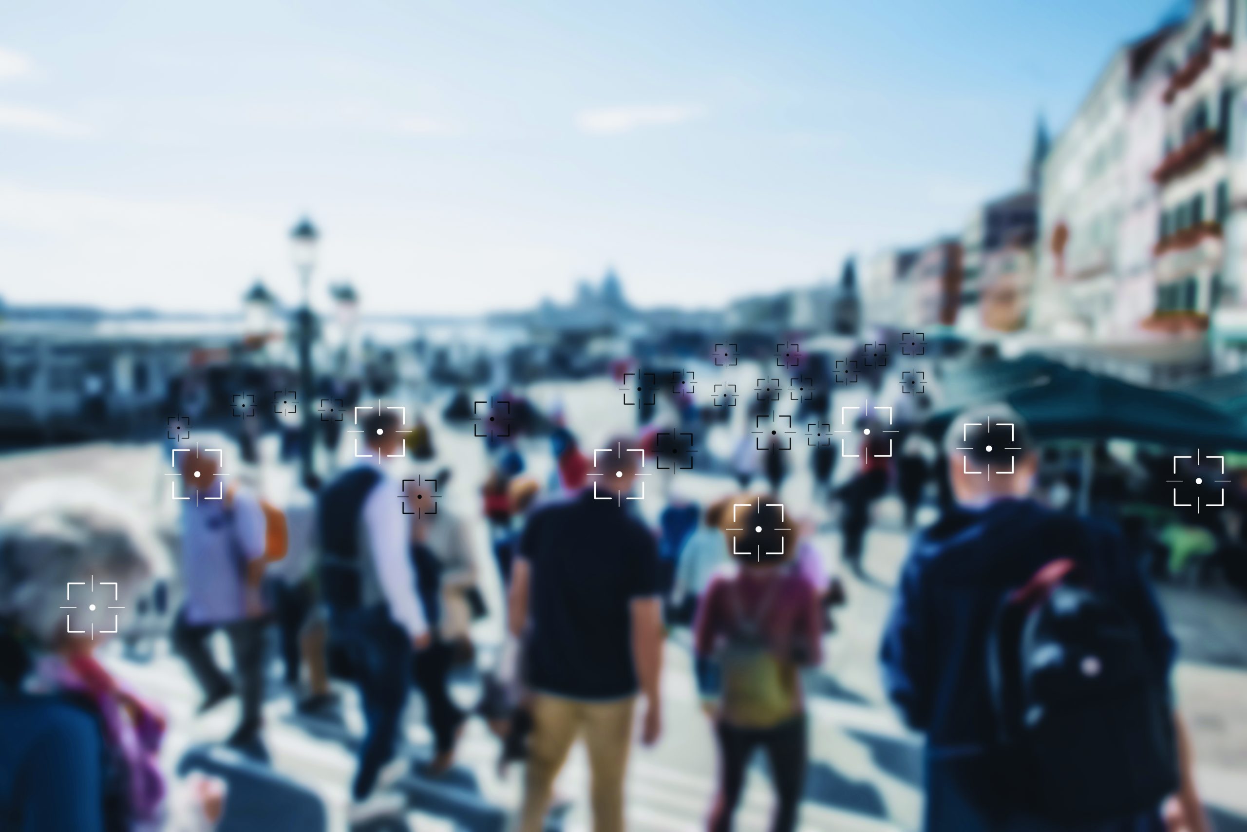 Face recognition signs and tags on people faces. Privacy and personal data protection. Blurred picture with drawn symbols.