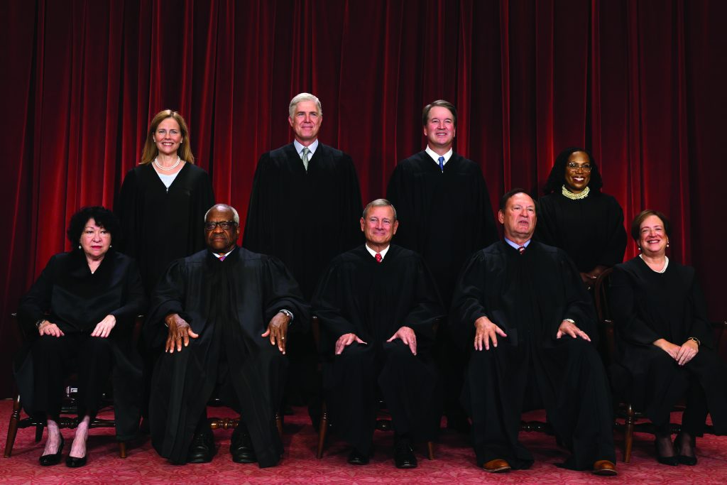 WASHINGTON, DC - OCTOBER 07: United States Supreme Court (front row L-R) Associate Justice Sonia Sotomayor, Associate Justice Clarence Thomas, Chief Justice of the United States John Roberts, Associate Justice Samuel Alito, and Associate Justice Elena Kagan, (back row L-R) Associate Justice Amy Coney Barrett, Associate Justice Neil Gorsuch, Associate Justice Brett Kavanaugh and Associate Justice Ketanji Brown Jackson pose for their official portrait at the East Conference Room of the Supreme Court building on October 7, 2022 in Washington, DC. The Supreme Court has begun a new term after Associate Justice Ketanji Brown Jackson was officially added to the bench in September. (Photo by Alex Wong/Getty Images)