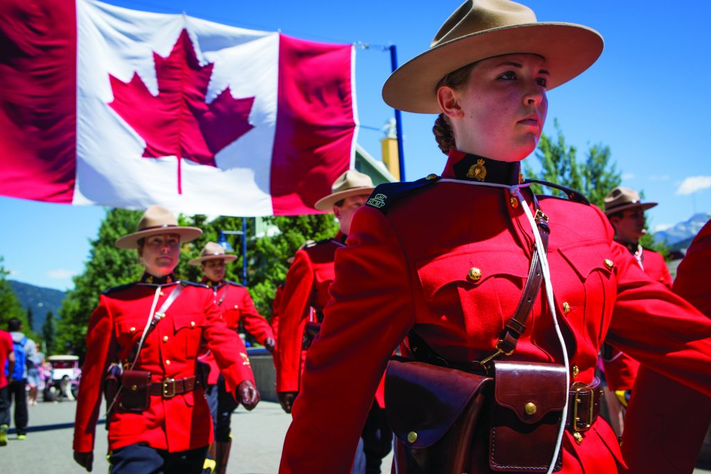 RCMP marching in Canada day parade. - Police Chief Magazine