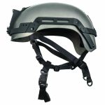 Side view of a gray ballistic helmet with black accessory rails, exterior mounting hardware, adjustable retention straps, quick‑release buckle, suspension system, and matte protective shell displayed against a plain white background