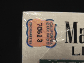 Counterfeit Marlboro cigarettes, with affixed counterfeit California cigarette tax stamp.