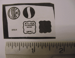 Templates for printing counterfeit Chicago/Cook County and Illinois state cigarette tax stamps.