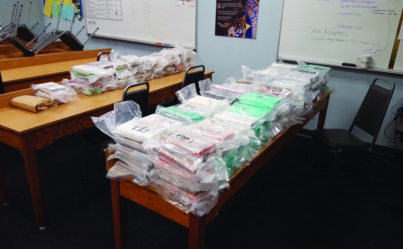 confiscated packages of cocaine on tables