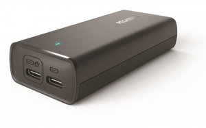 Compact black portable charger with matte finish, green LED indicator, and dual USB‑C ports on one end, shown angled against a clean white background