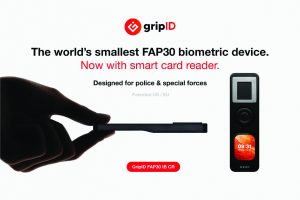 Advertisement showing a slim biometric ID device held in a hand, with product images and text highlighting a compact FAP30 unit with smart card reader for police use