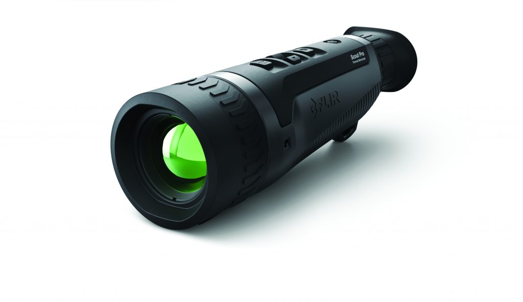 Black FLIR Scout Pro thermal monocular with green-tinted lens, textured grip, and top control buttons; angled to show side and front view clearly