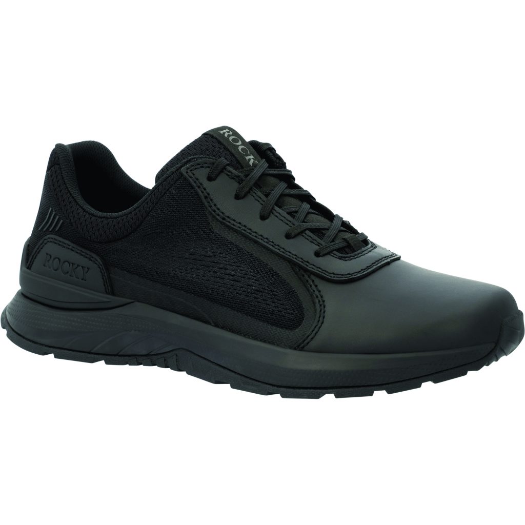 Black low‑cut tactical duty shoe with lace‑up closure, smooth toe, textured side panels, padded collar, reinforced heel, and rugged slip‑resistant outsole on a white background