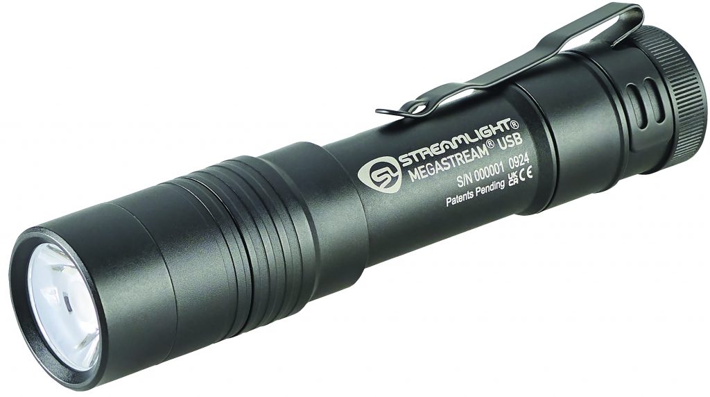 A close-up image of a rechargeable flashlight, featuring a sleek, cylindrical design with a textured grip and a bright LED light at the front. The flashlight is placed on a reflective surface, highlighting its metallic finish.