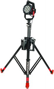 Portable scene lighting unit on a tripod with extendable legs, LED lamp head, control box, cabling, and Streamlight branding displayed on a white background