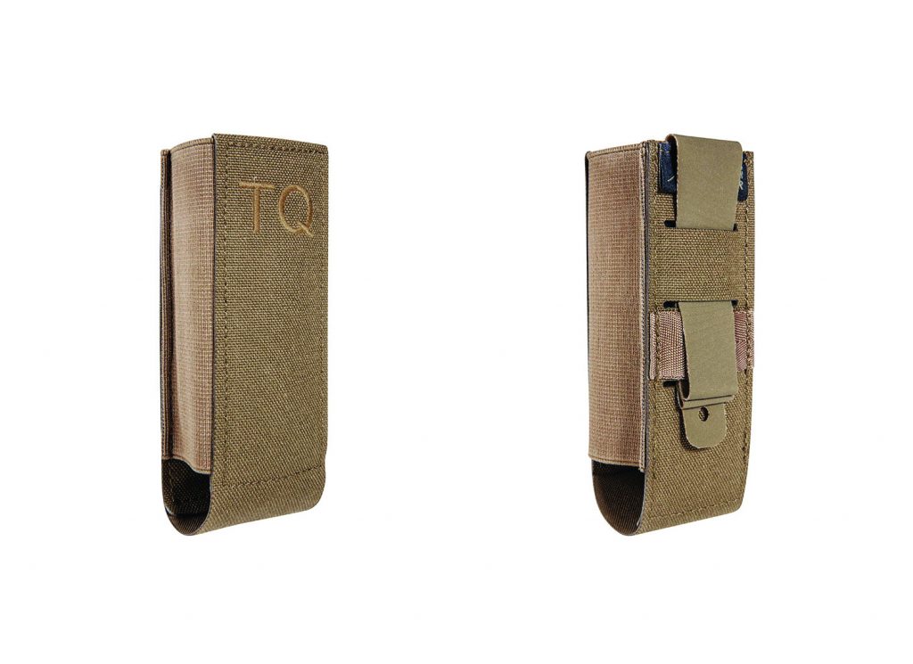 The image shows two views of a tan-colored tactical pouch designed to hold a tourniquet. The front view on the left displays the pouch with "TQ" embroidered in capital letters near the top. The back view on the right reveals a sturdy clip for attaching the pouch to a belt or gear, along with reinforced stitching for durability. The material appears to be rugged and suitable for law enforcement use.