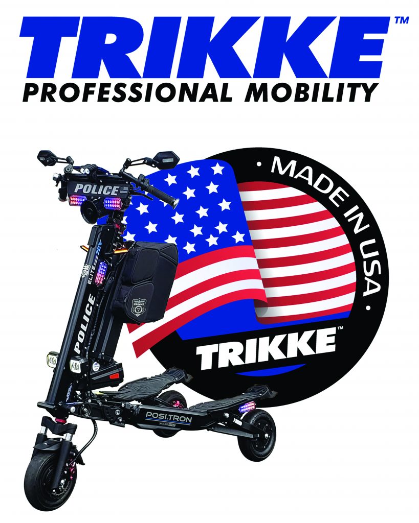 A three-wheeled electric vehicle, known as a Trikke, parked on a flat surface. The Trikke is designed for efficient and agile transportation, featuring a sleek and modern design.