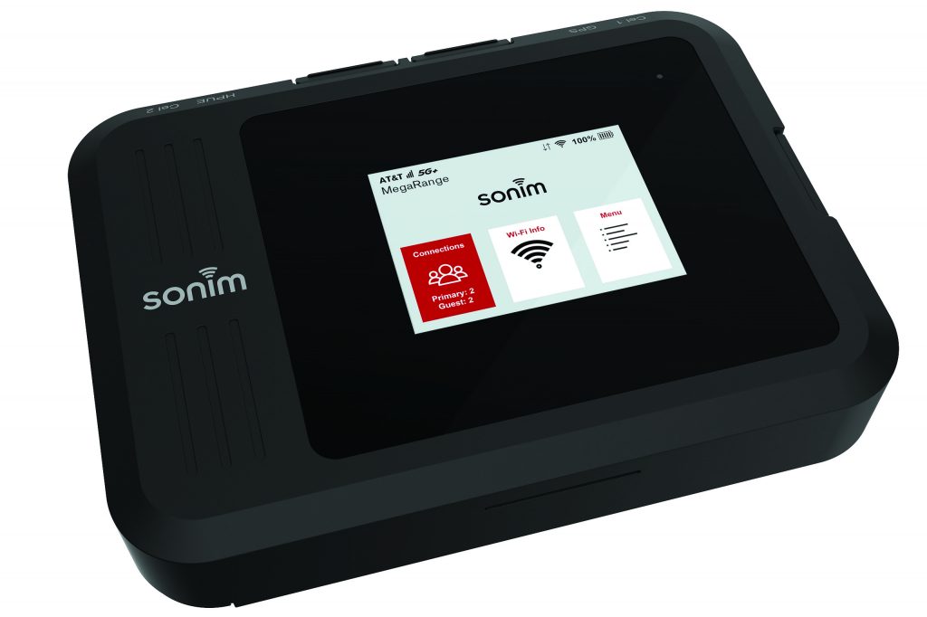 Close-up of a Sonim portable Wi-Fi hotspot device with touchscreen showing AT&T 4G MegaRange, connection status, Wi-Fi info, and menu options on display